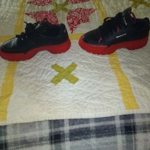 Cardi Reebok's tennis shoes